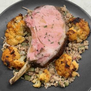 pork chop with roasted cauliflower and farro salad