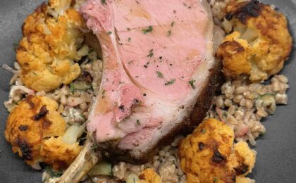 pork chop with roasted cauliflower and farro salad